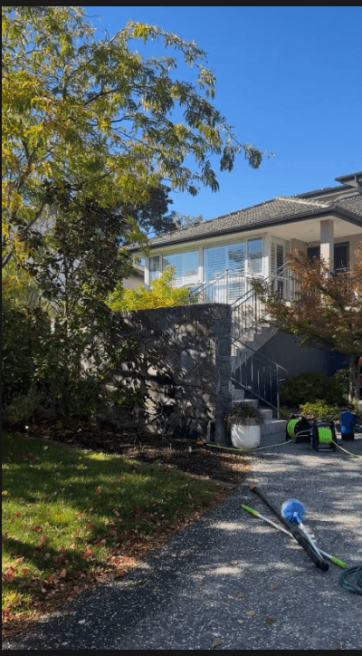 Brick suburban home with cleaned exterior windows